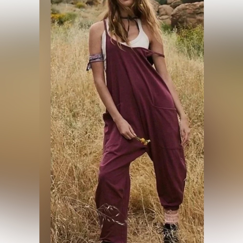 FREE PEOPLE ONESIE HOT SHOT in Pomegranate NWOT 
Sz M